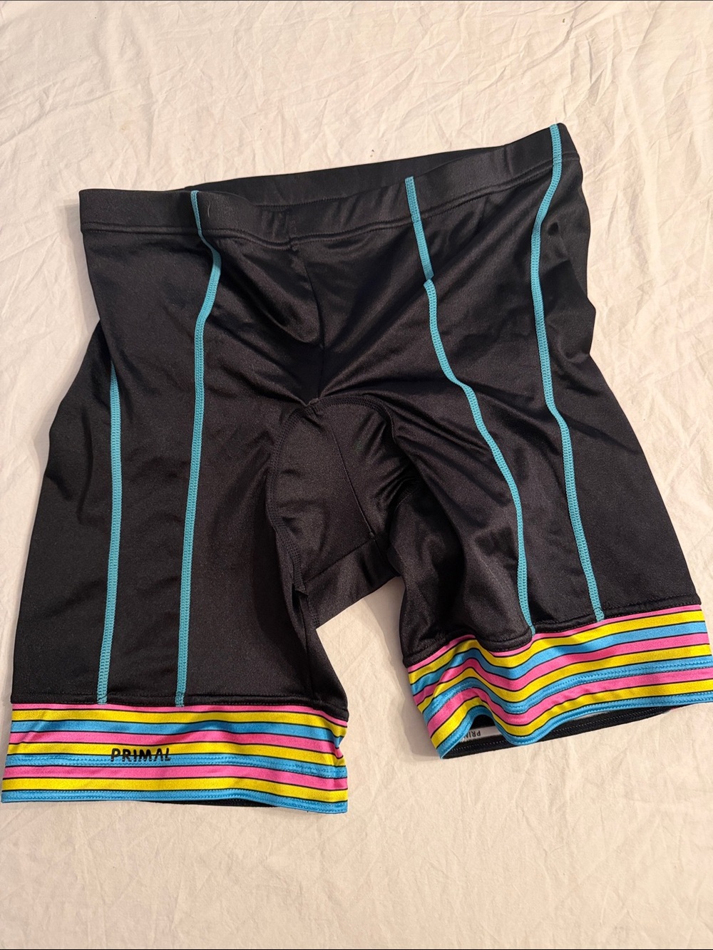 Women’s Primal Black Athletic Cycling Shorts with Aqua Piping and Rainbow Hem